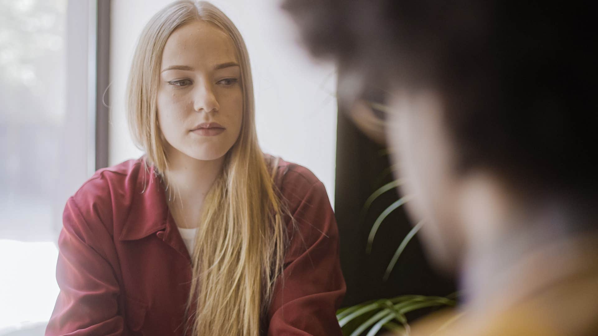 friends are jealous if you feel drained after seeing certain people your gut is trying hard to tell you these things woman looking jealous of her friend