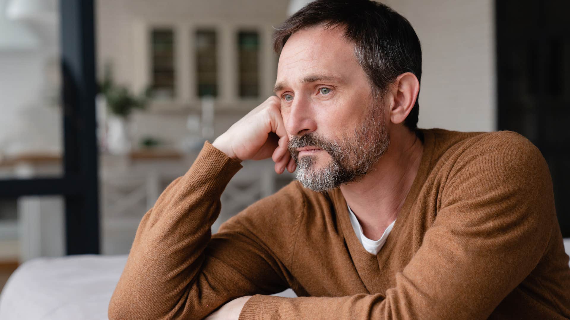 losing sight of identity if you feel drained after seeing certain people your gut is trying hard to tell you these things Man who's losing sight of his identity at home.