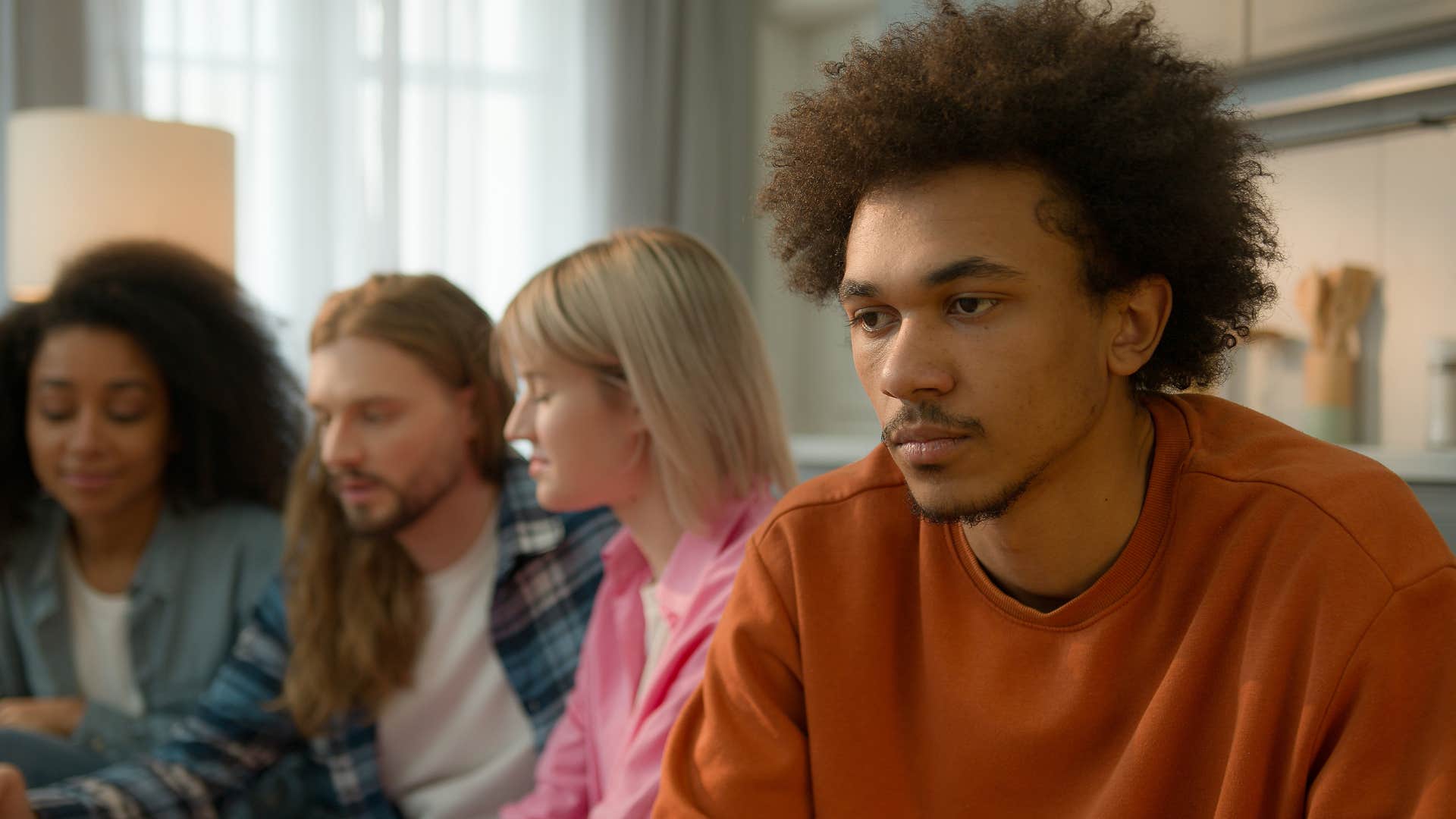 you're not around right people if you feel drained after seeing certain people your gut is trying hard to tell you these things Man who's not around the right people looking upset.