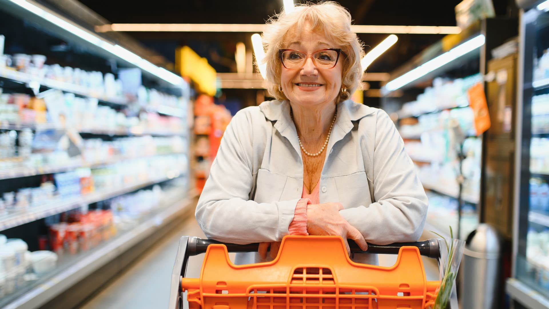 Woman who invested in a grocery wagon in the store.