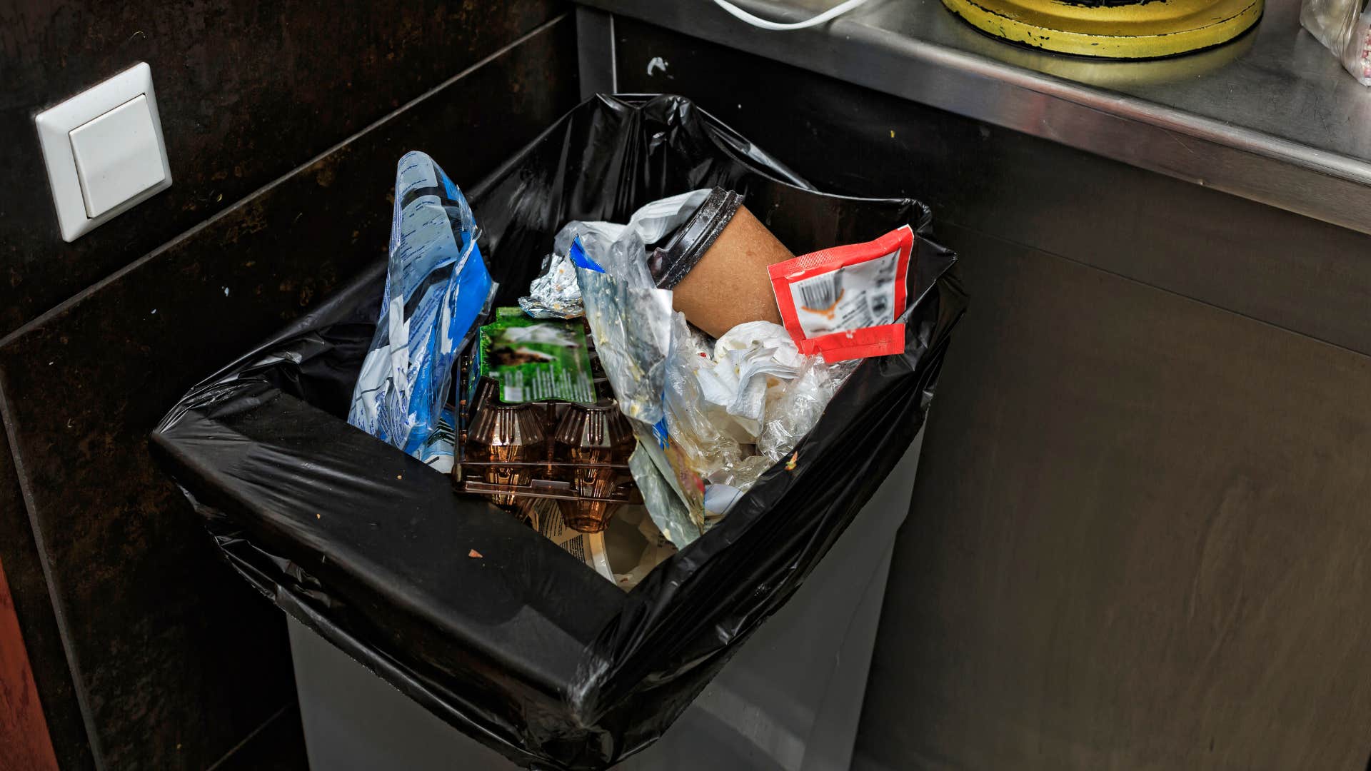 if you notice these things in someone’s house they’re probably going through a hard time overflowing trash can 