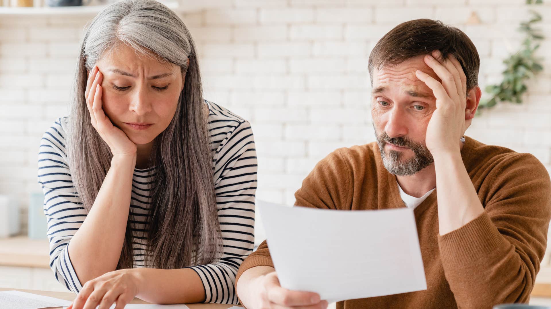 older couple avoiding home upgrades in their house