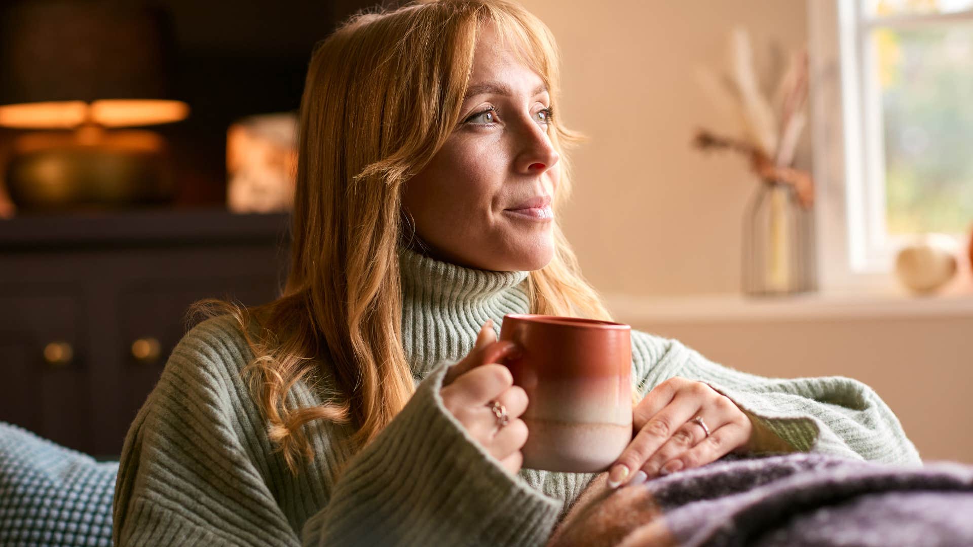 comofortable spaces if you notice these things missing from someone's home they've probably been through a lot in life woman relaxing in comfortable spaces at home