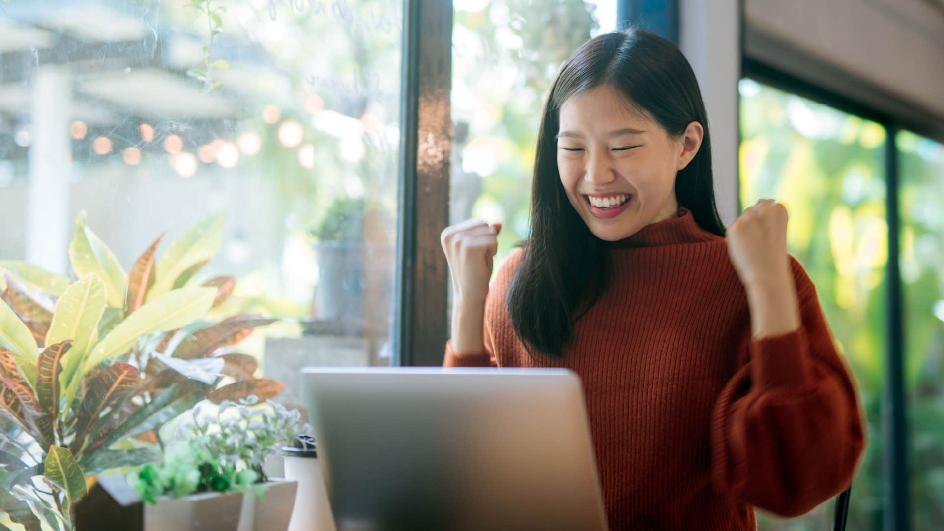 woman celebrating a small win
