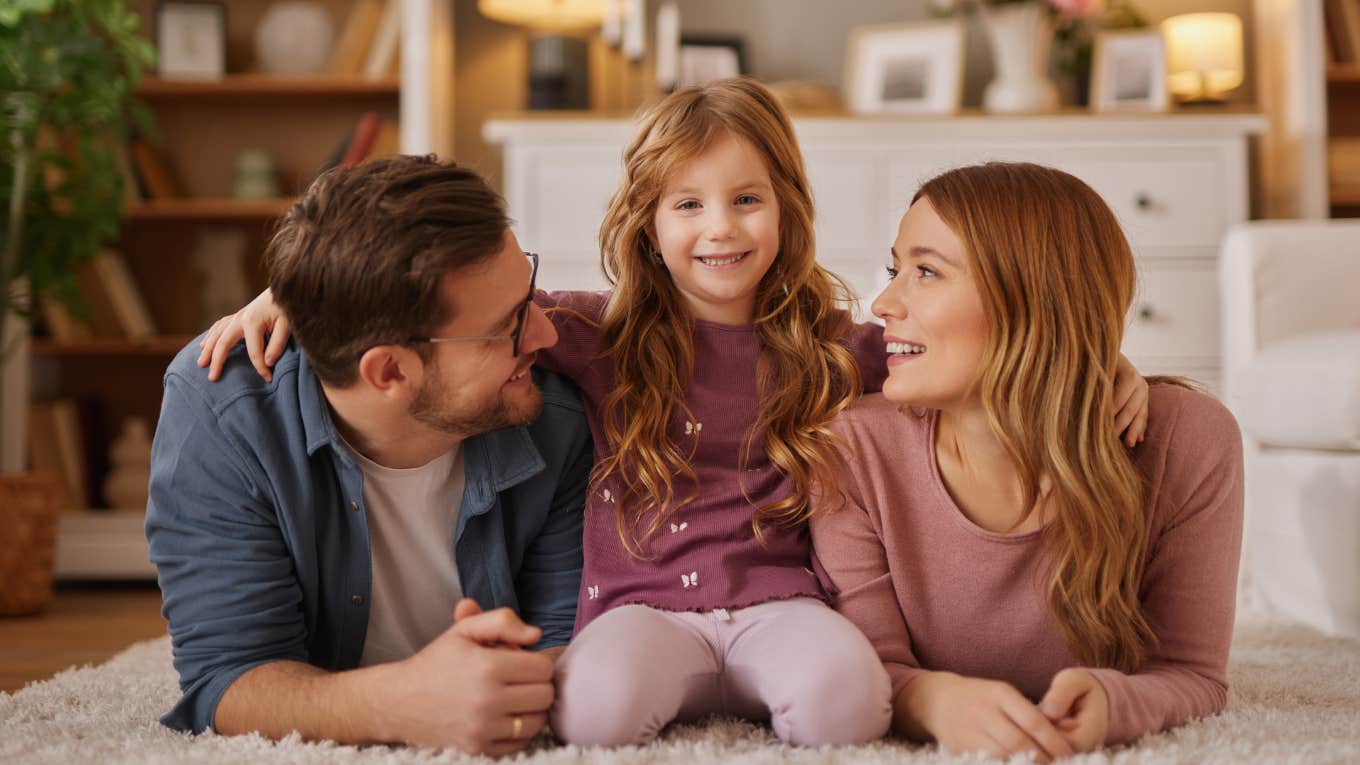 The Keys To Success: Lessons The Most Successful Kids Learn From Their Parents loving parents sitting on the floor with child teaching them lessons