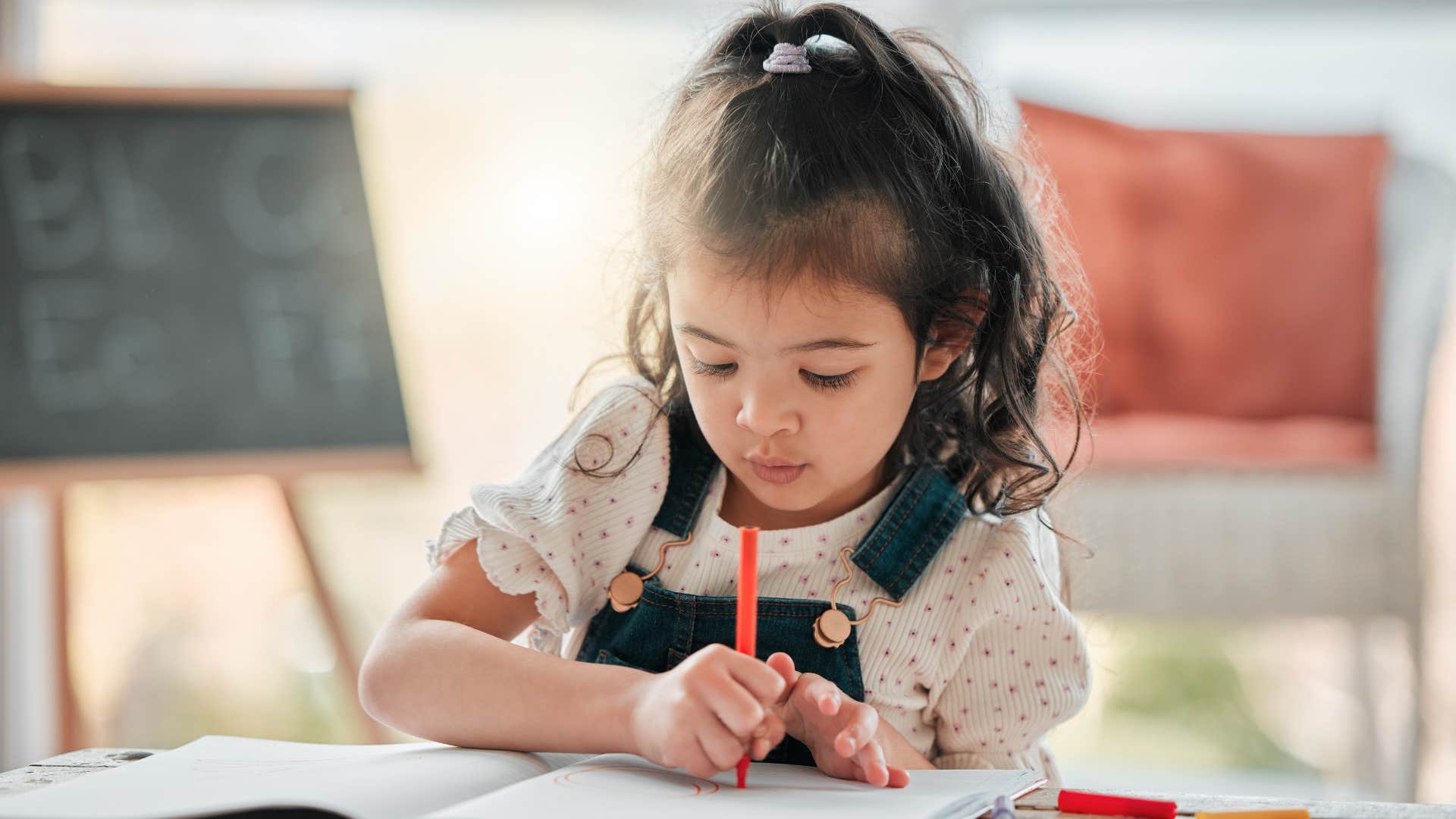 lessons the most successful kids learn from their parents strong work ethic little girl writing and coloring