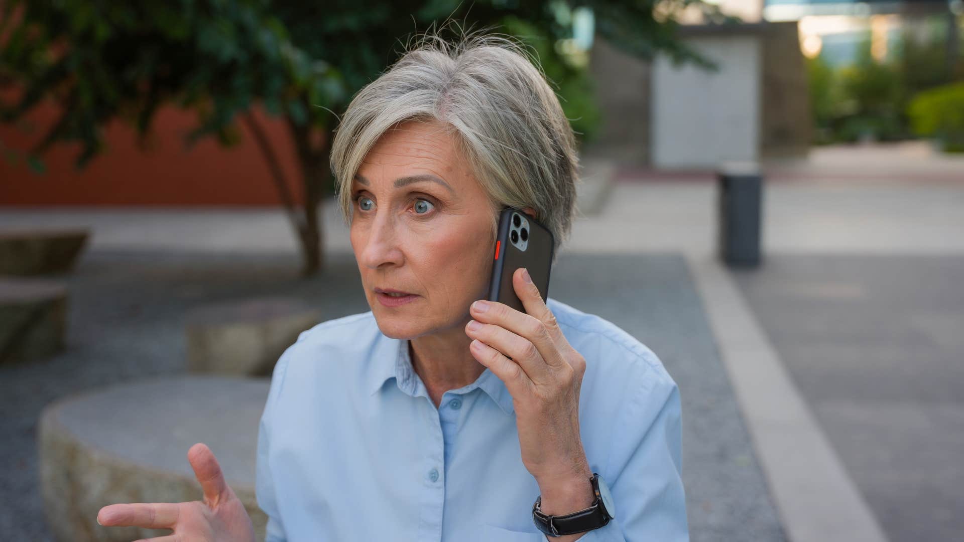 woman on phone saying fine do whatever you want