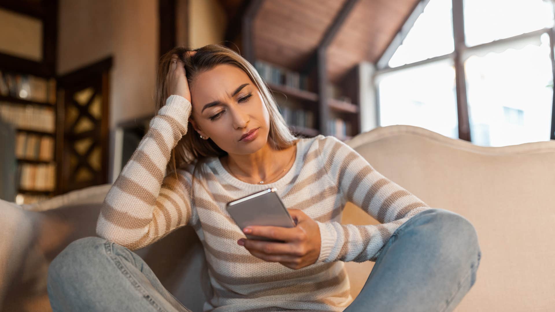 woman texting thinking i guess i just care more than you do