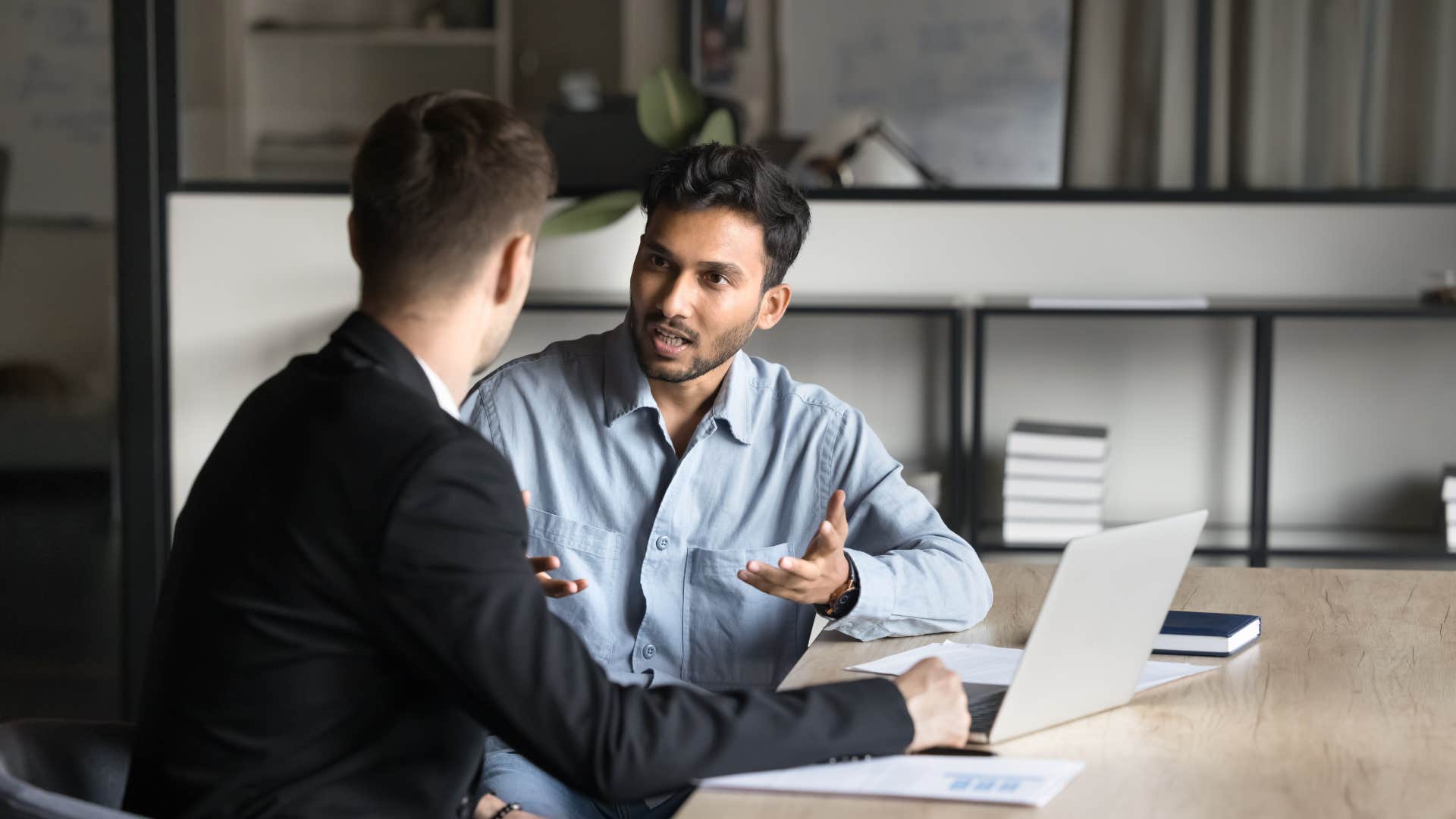 man telling colleague you're making a big mistake