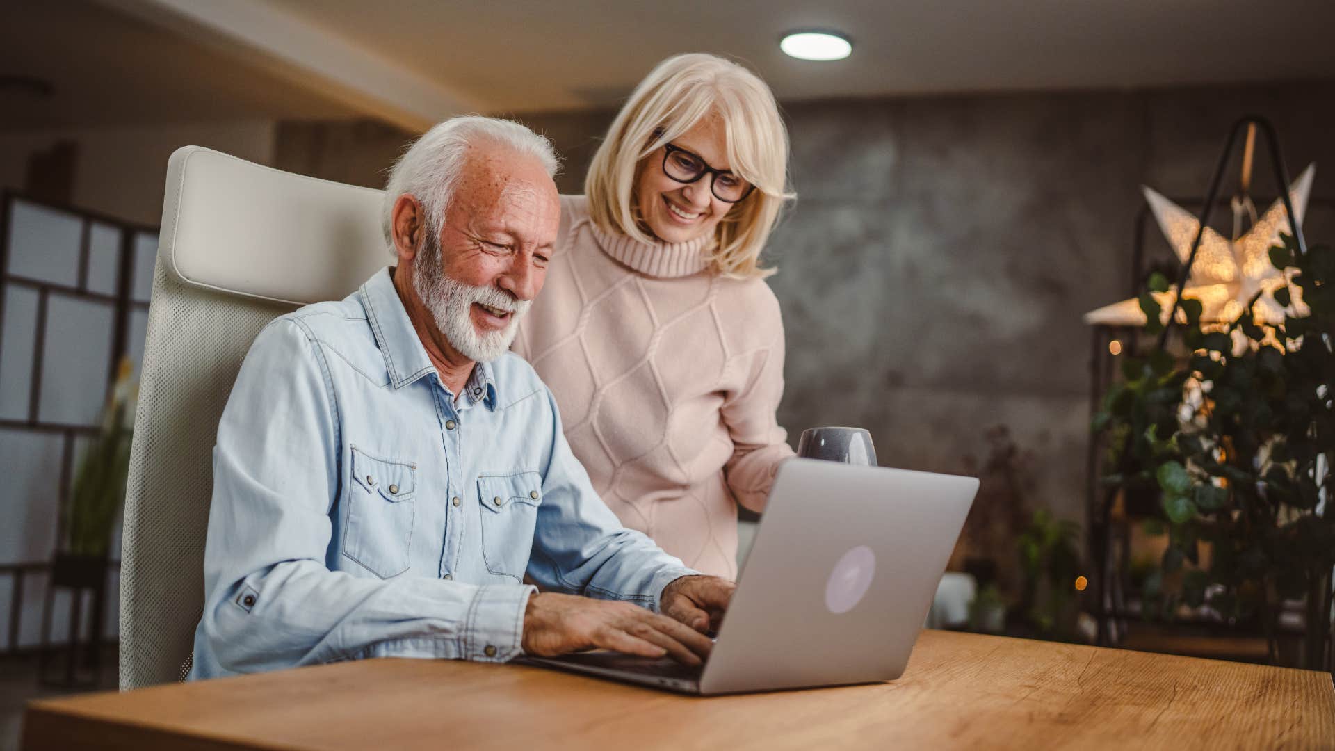 man who does things without being asked sitting with his wife
