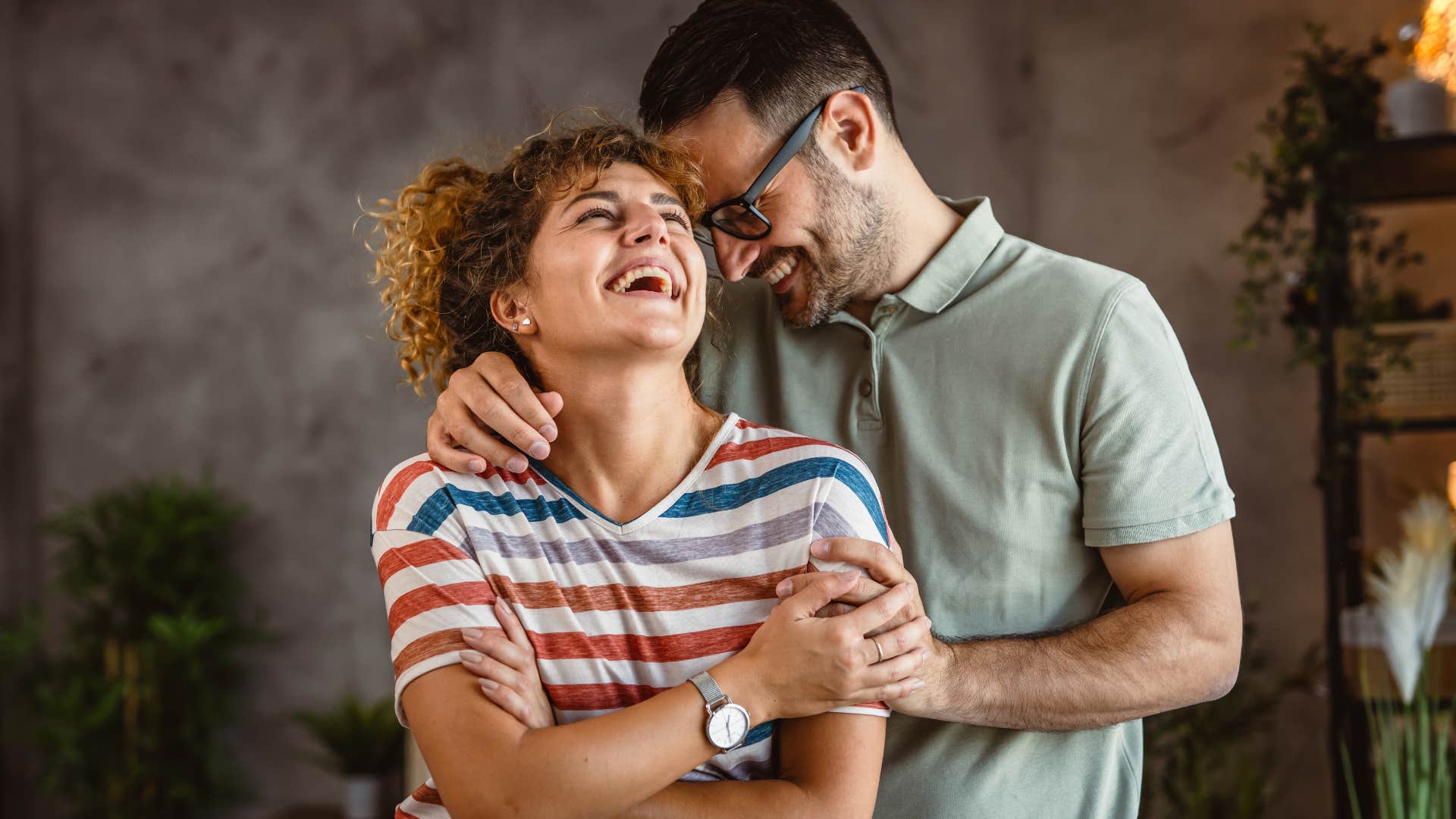 couple laughing together after husband noticed little things