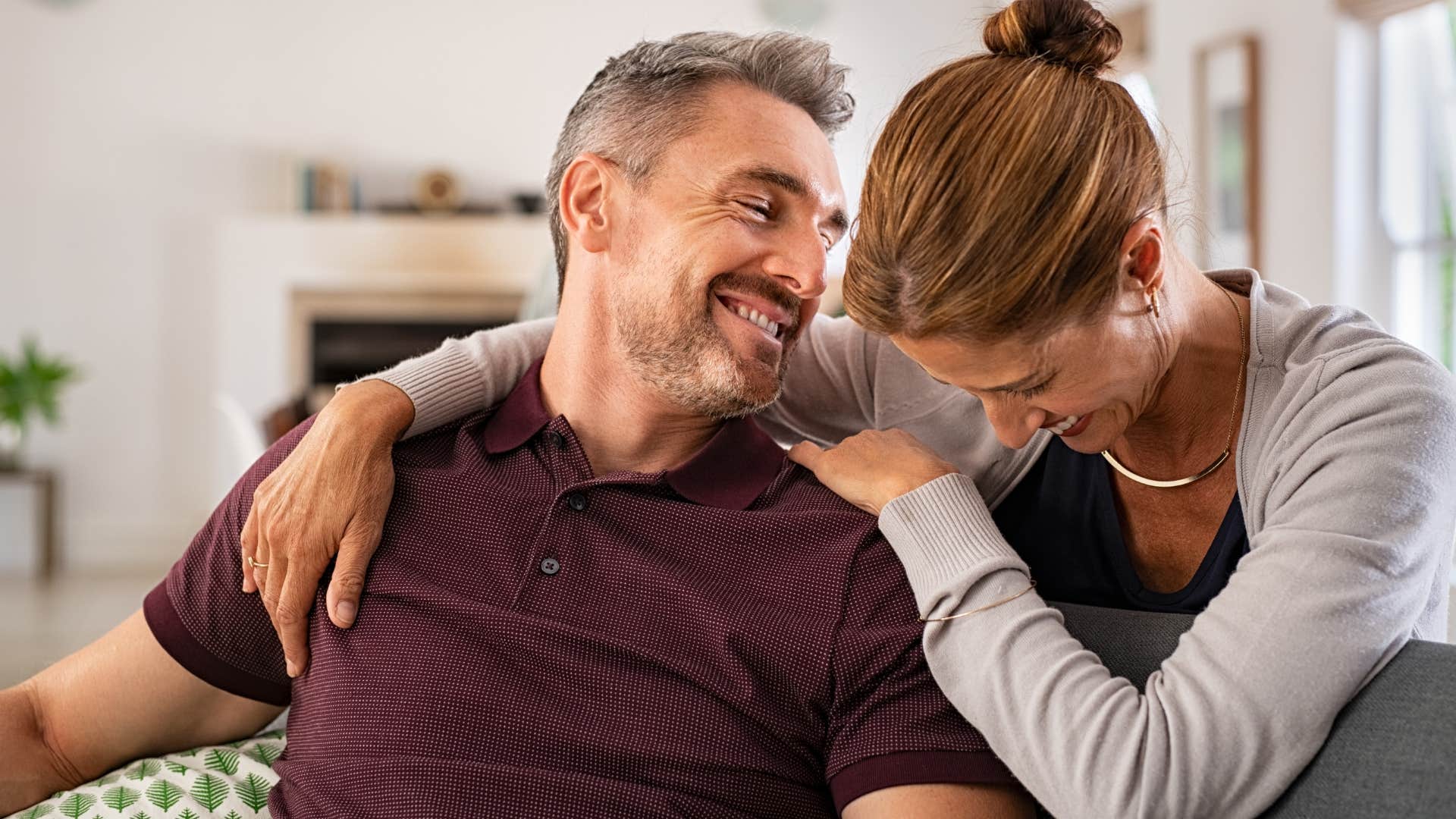 laugh with her often men who still adore their wives after years always do these ordinary things that mean everything couple laughing together