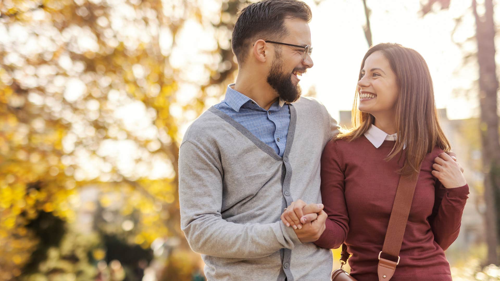 reach for their hands men who still adore their wives after years always do these ordinary things that mean everything man reaching for his wife's hand walking outside