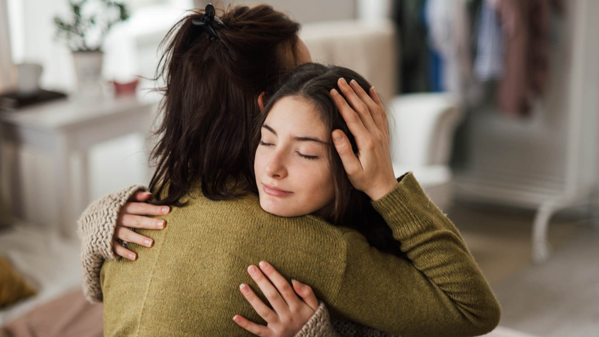 mom hugging daughter listening without judgment