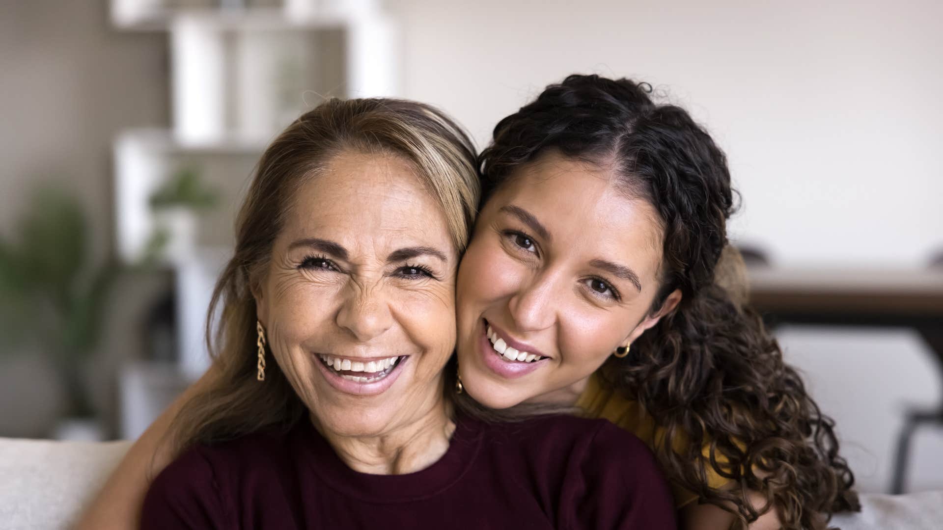 mom and daughter smiling showing unconditional love