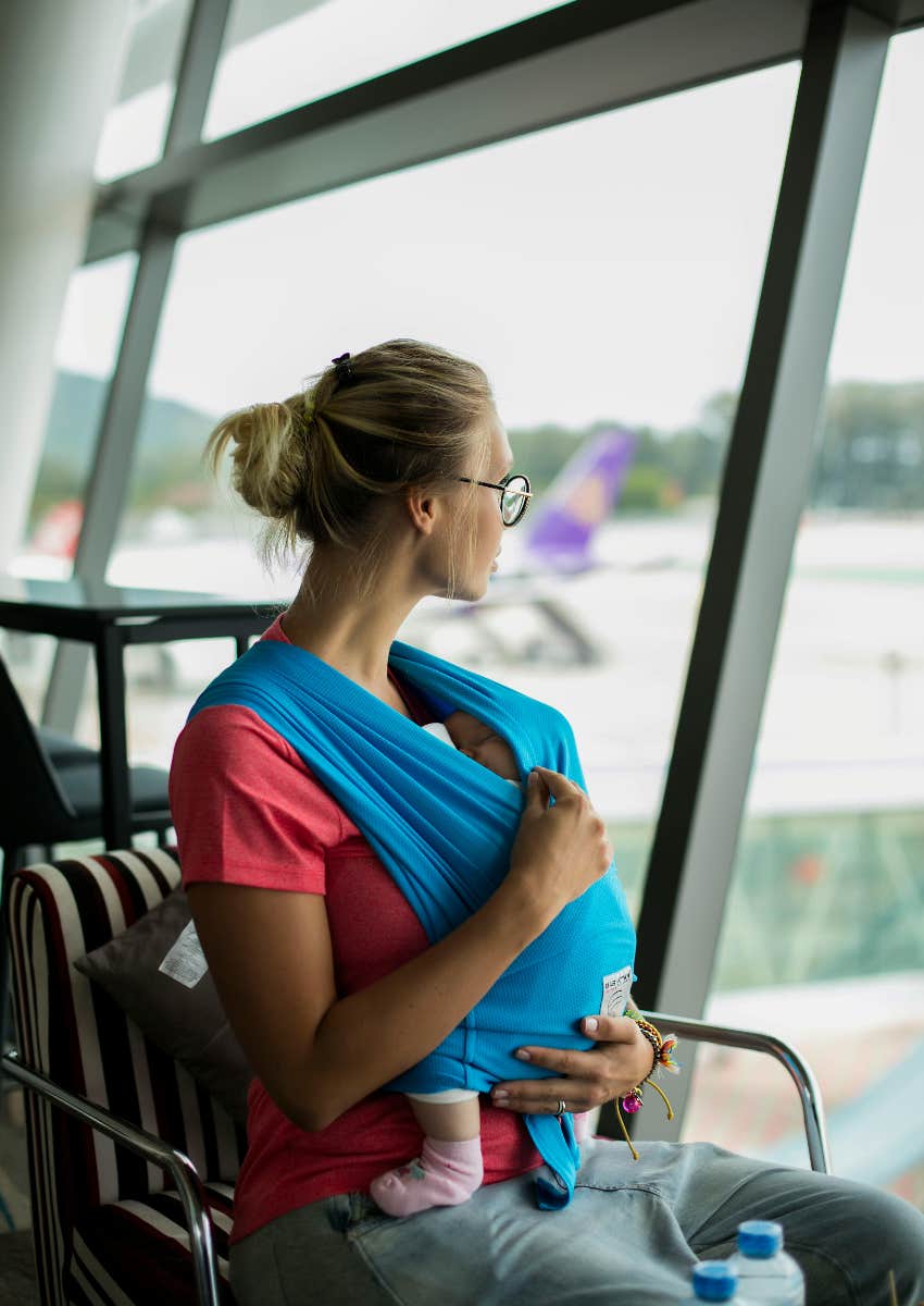 Mom Flying With Her Baby Told That Babies Aren't Allowed In Business Class mom and baby waiting in an airport