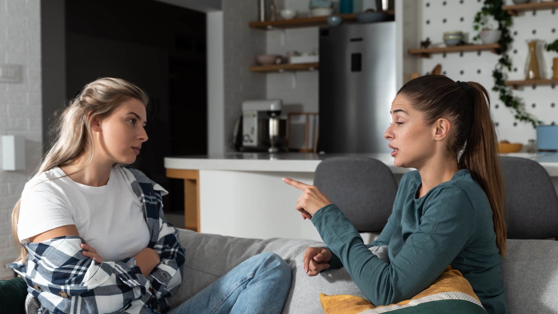 narcissistic woman having heated conversation with friend