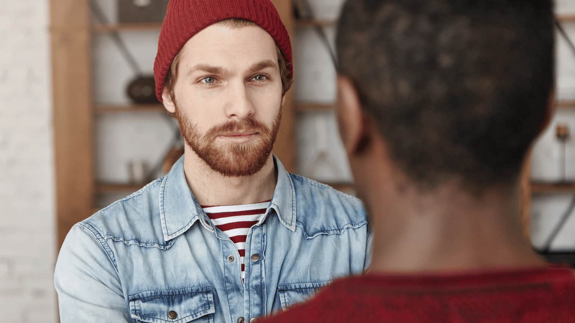 traits of a naturally intriguing person intriguing man being watchful