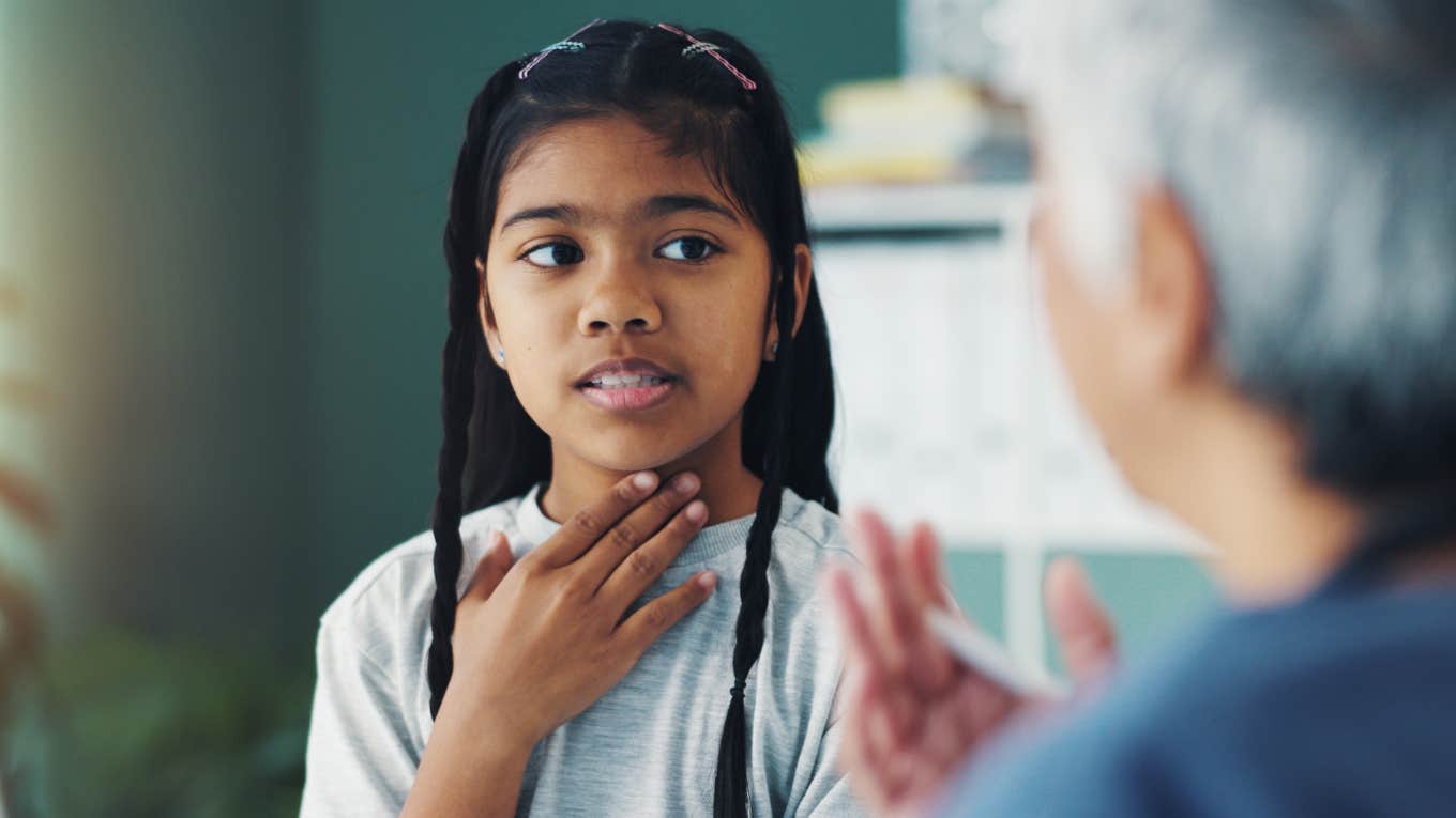 Neurodivergent girl explaining her meltdowns and outbursts to a parent 