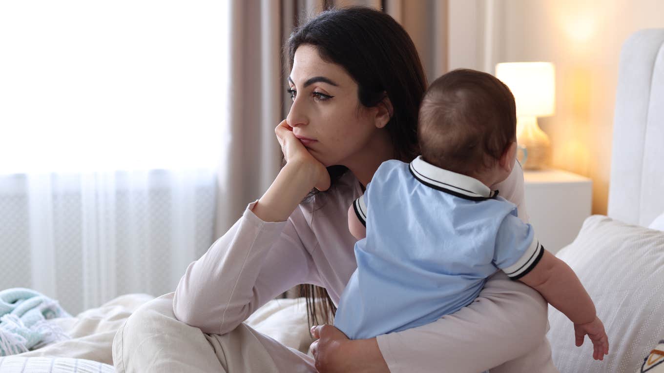 worried mom with baby