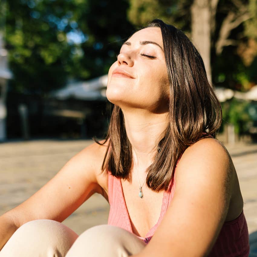 woman who is getting a nudge from the universe and a sign