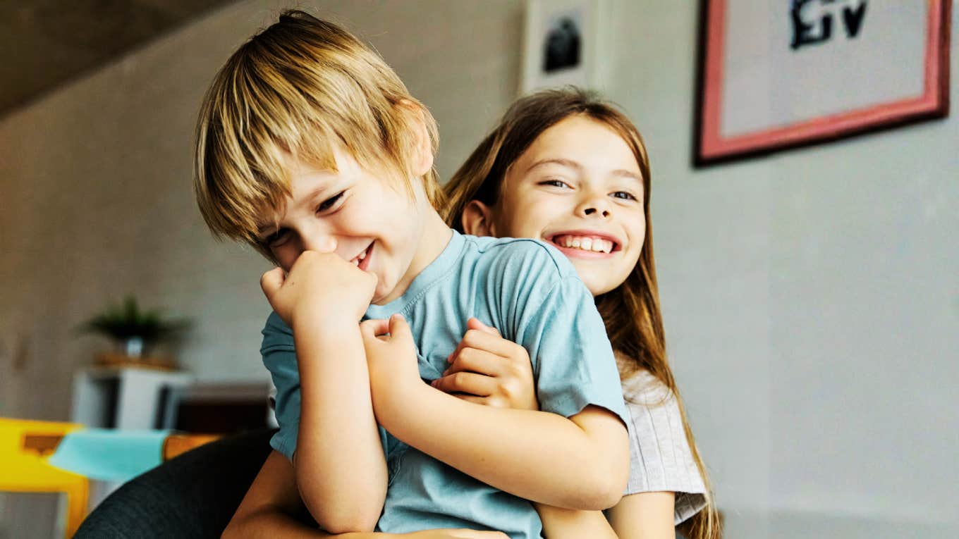 Innocent Old-Fashioned Joke Good Parents Refuse Make Boy and girl friends playing and laughing, but not at the old-fashioned joke