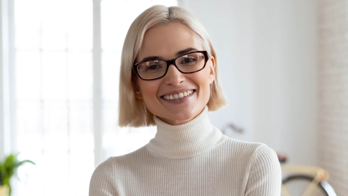 happy woman raised to not blame people