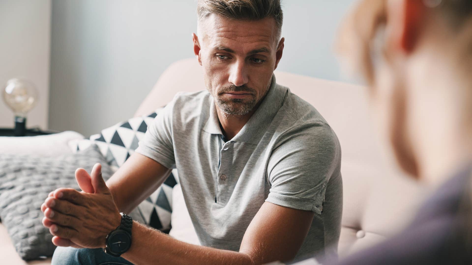 man saying uh huh to someone he doesn't like