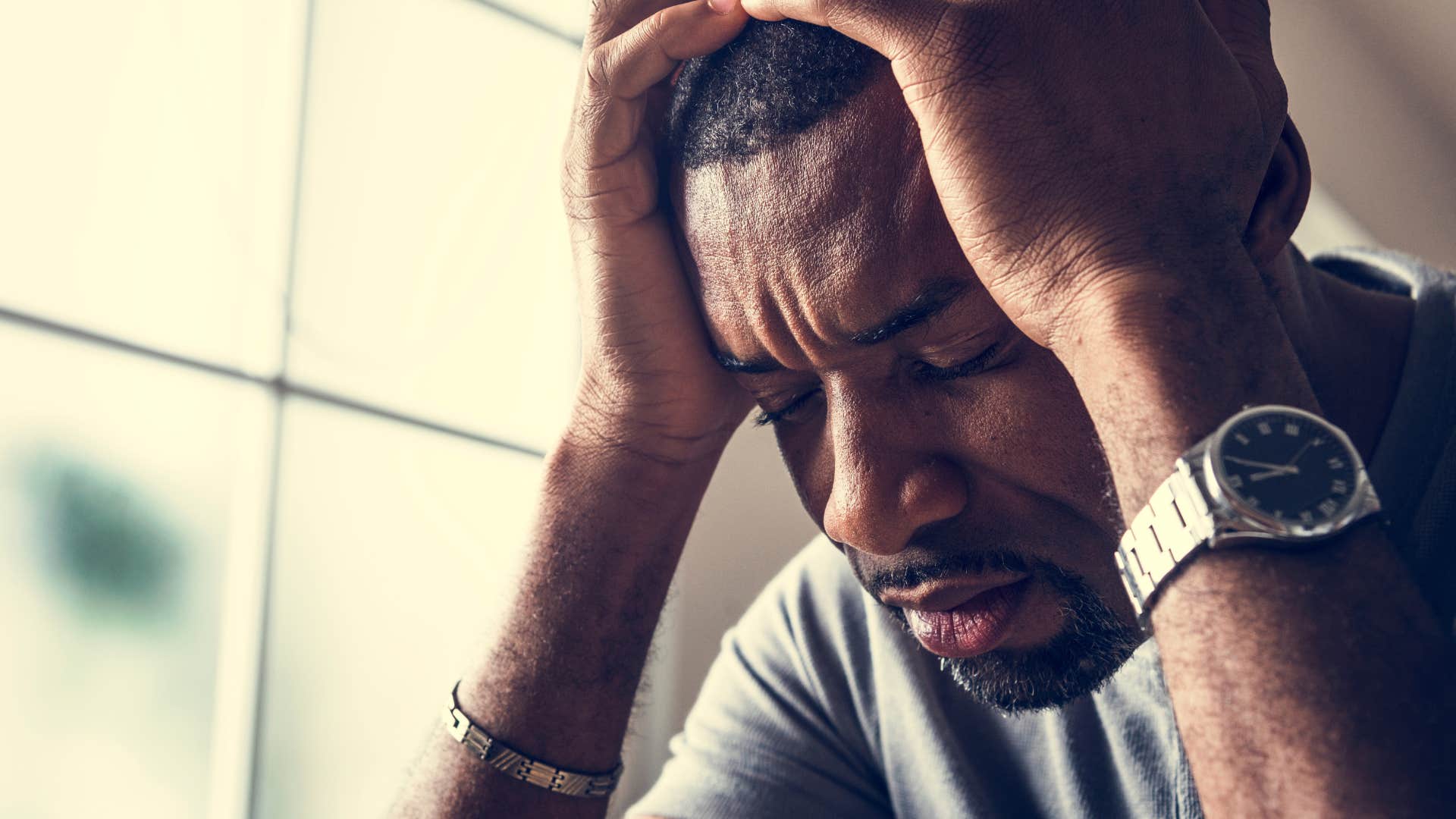 unhappy man saying I don't even care anymore looking distraught
