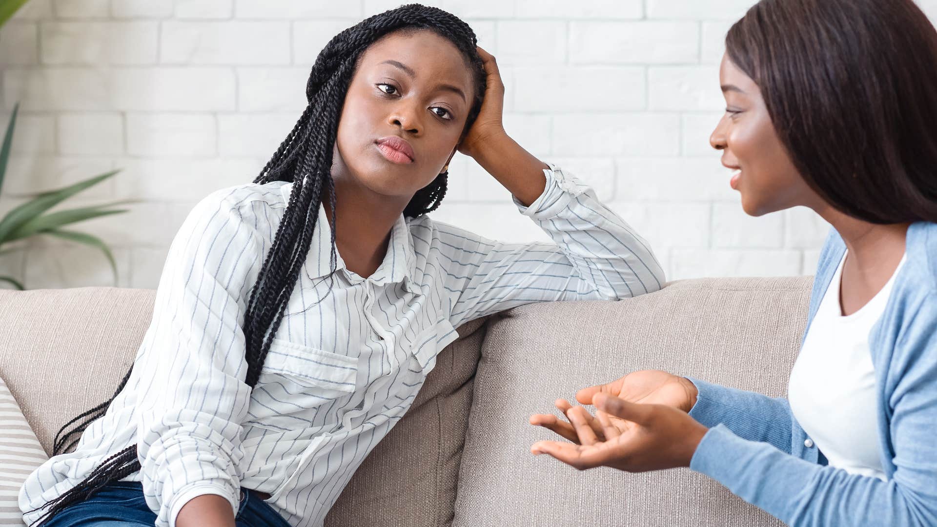 upset woman telling her friend im find