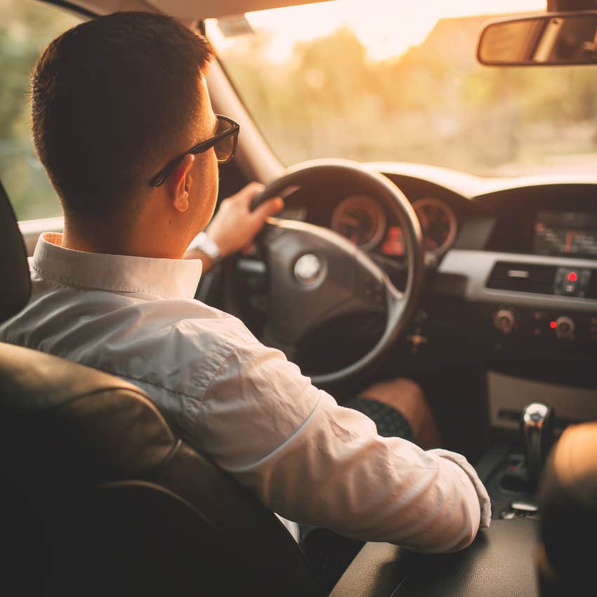 man driving car family member independence