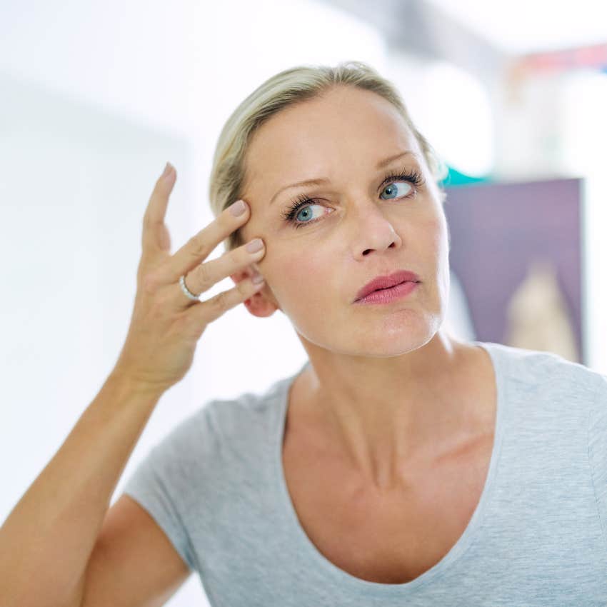 woman who doesn't get enough sleep noticing her skin is aging faster