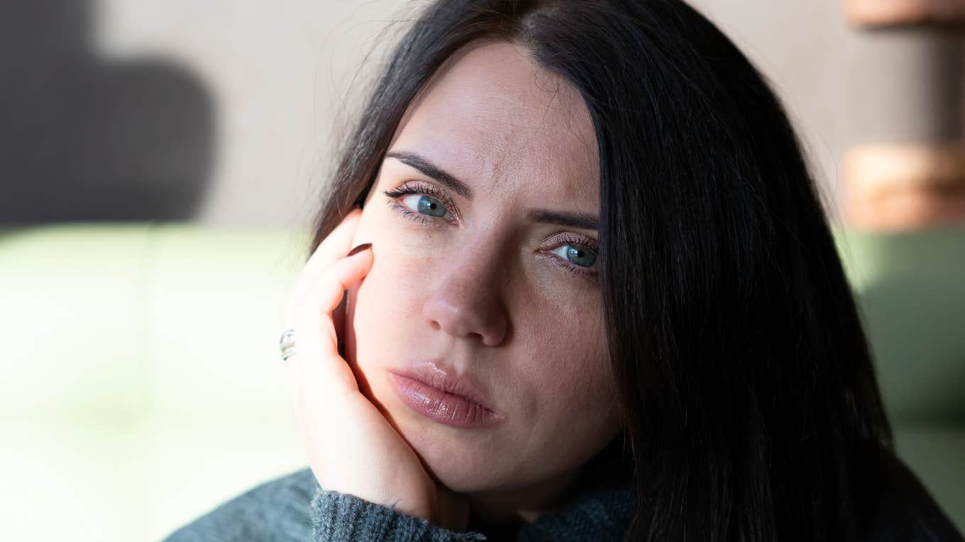 People With Low Emotional Intelligence Do These Things On A Regular Basis woman with low emotional intelligence looking upset