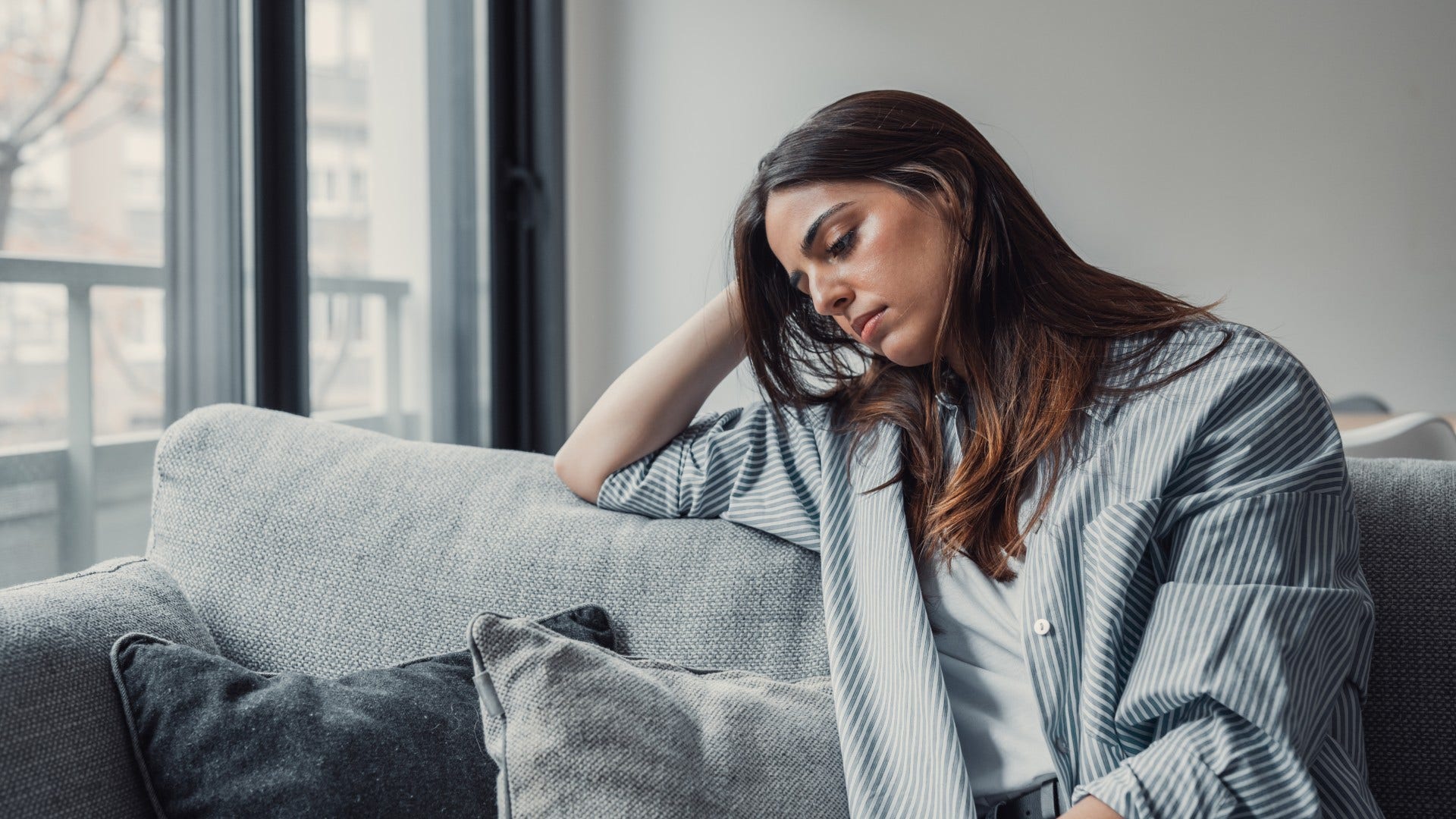 woman who struggles to give herself grace as she fails to recognize her progress