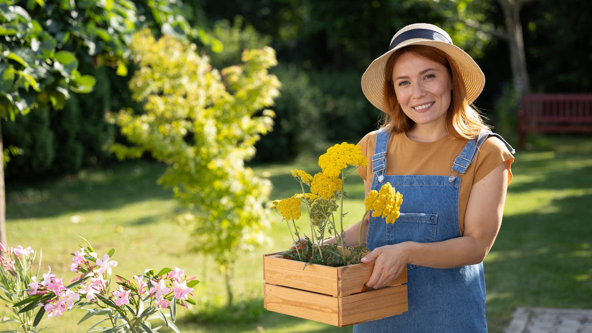 woman gardening outside looking happy