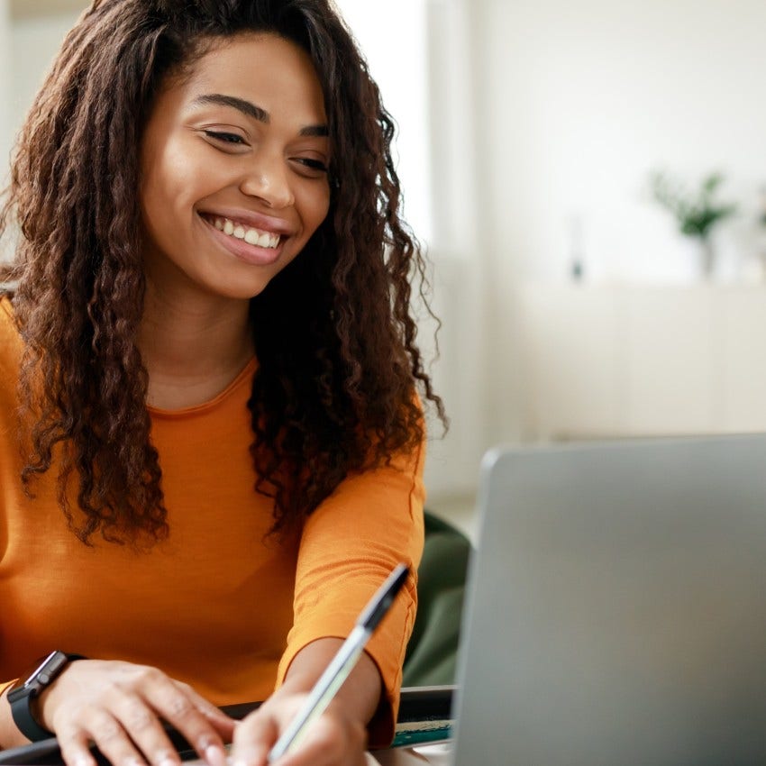 woman using the mind trick of setting a timer so she doesn't feel overwhelmed with big tasks