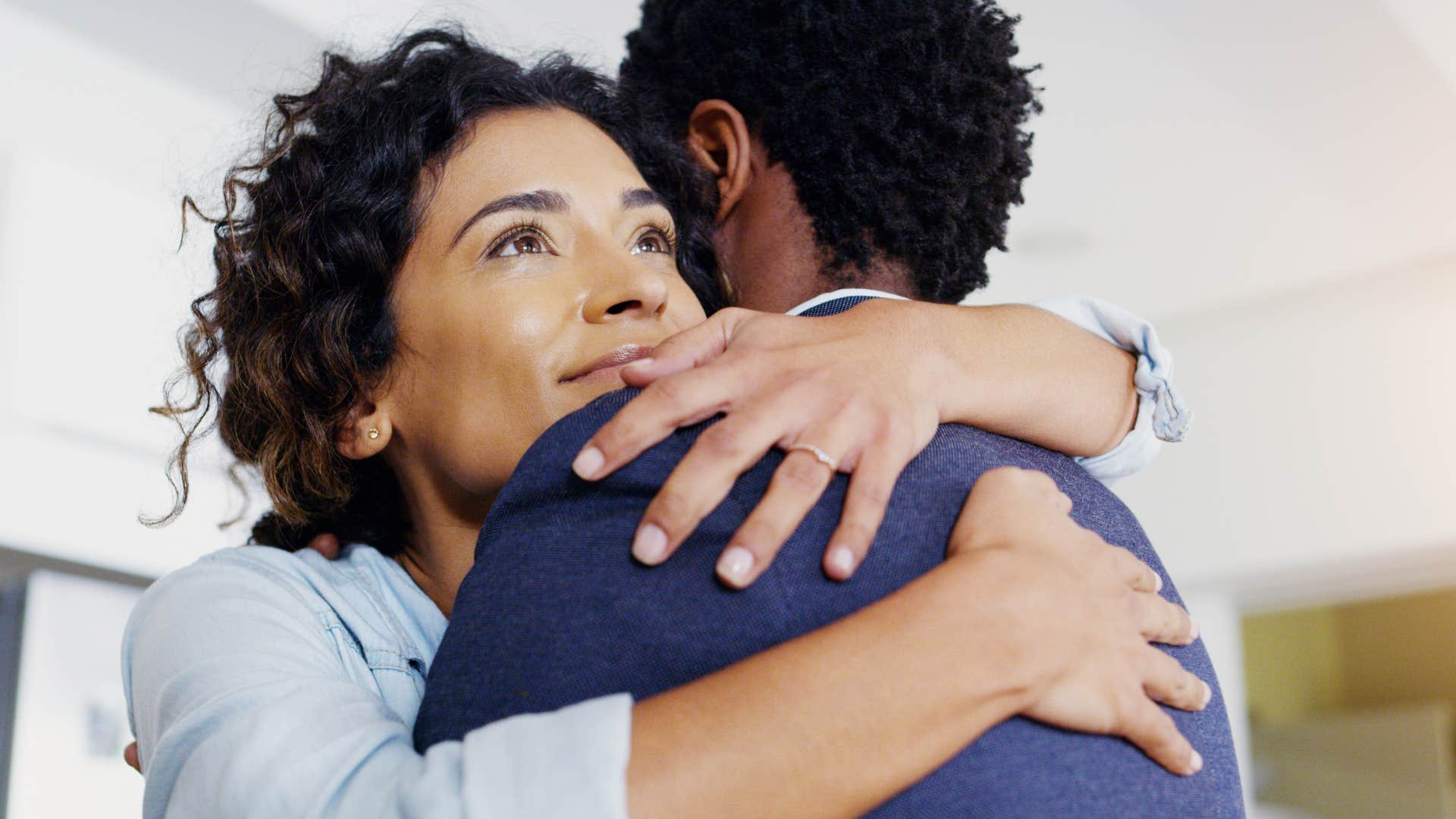 compassionate woman hugging her partner