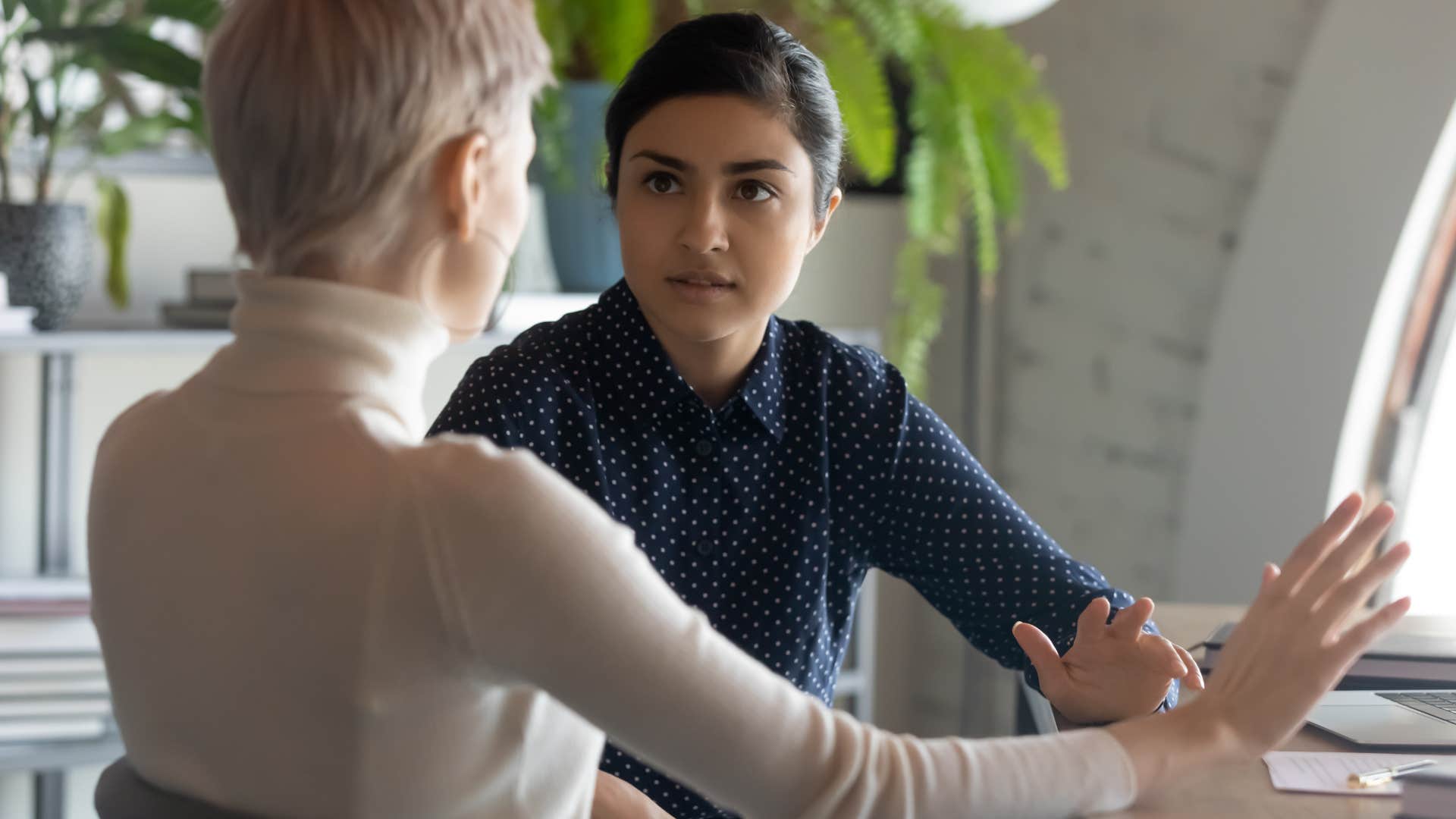 brilliant woman solving problems with colleague