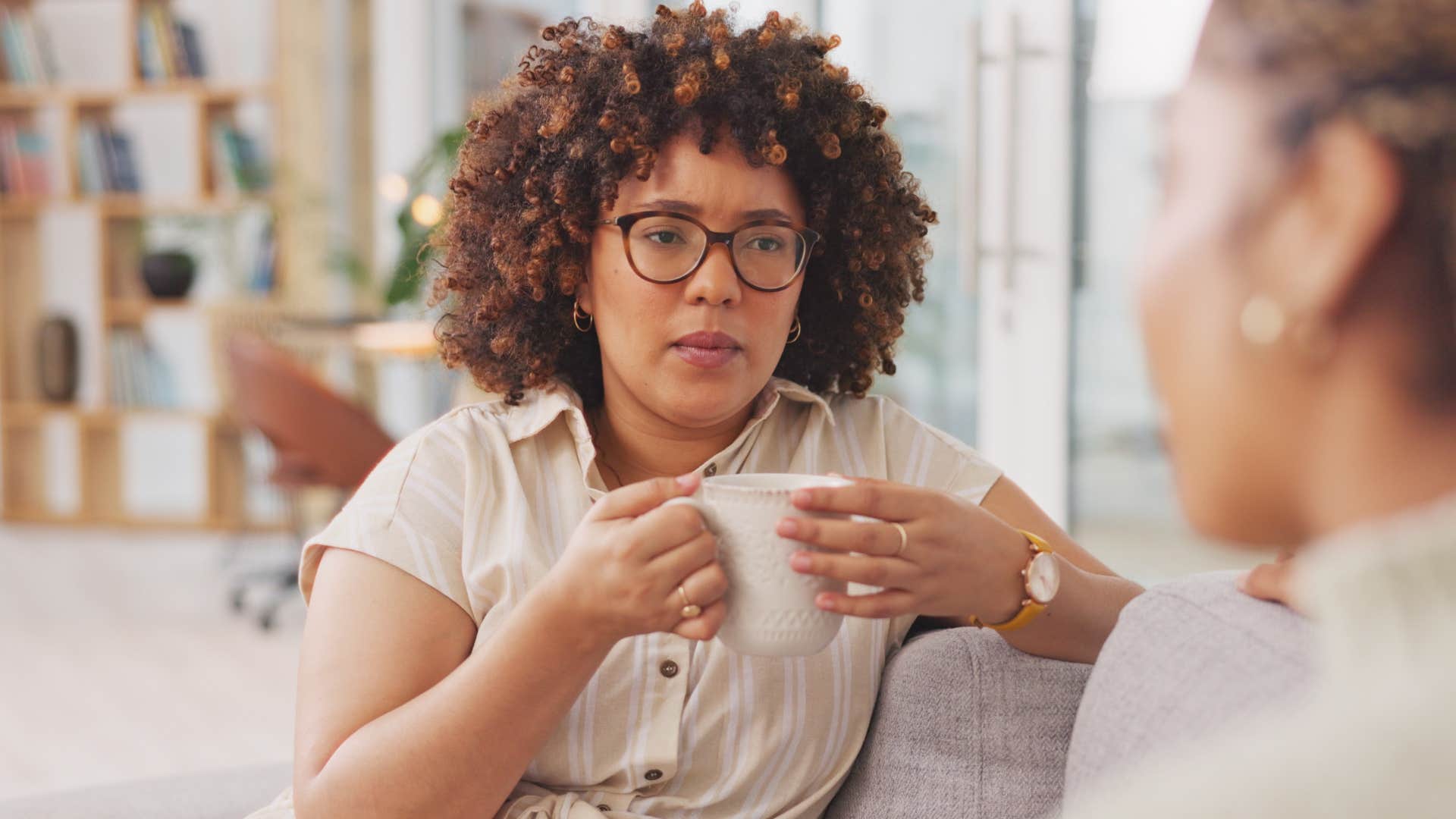 Woman who can pause before responding in a conversation.
