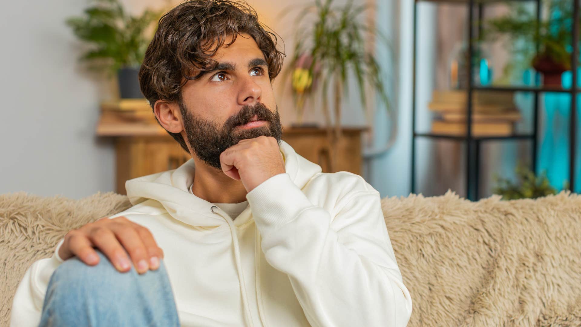 Man using solitude thoughtfully at home.