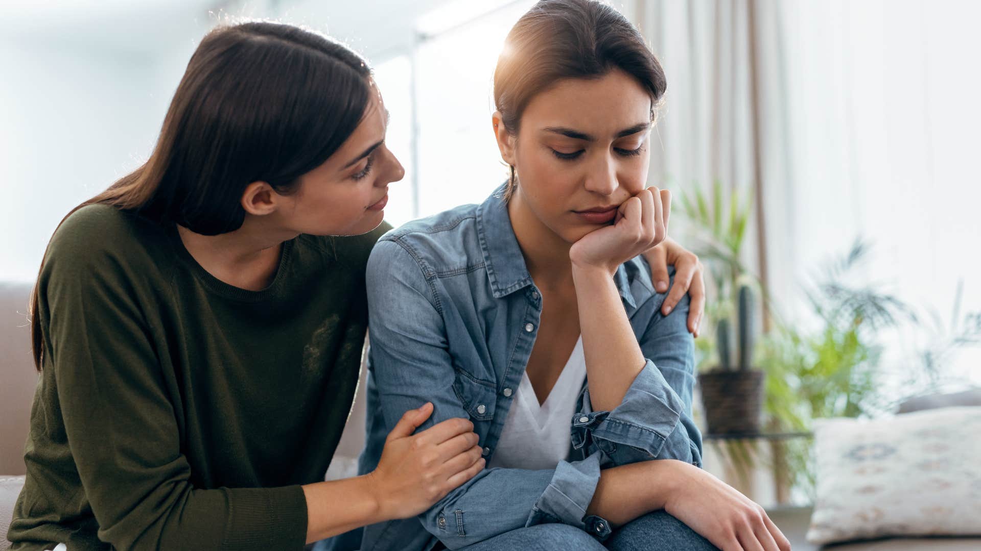 woman comforting friend who is thinking worst case scenario