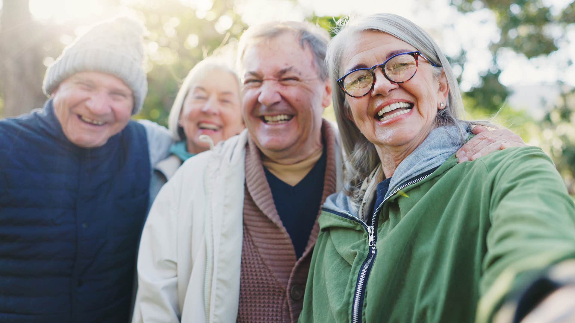 woman with a strong social circle smiling together