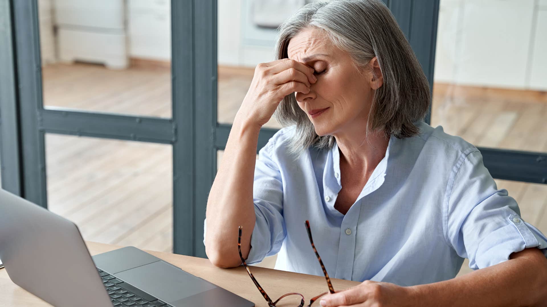 woman who intellectualizes her emotions sitting at work