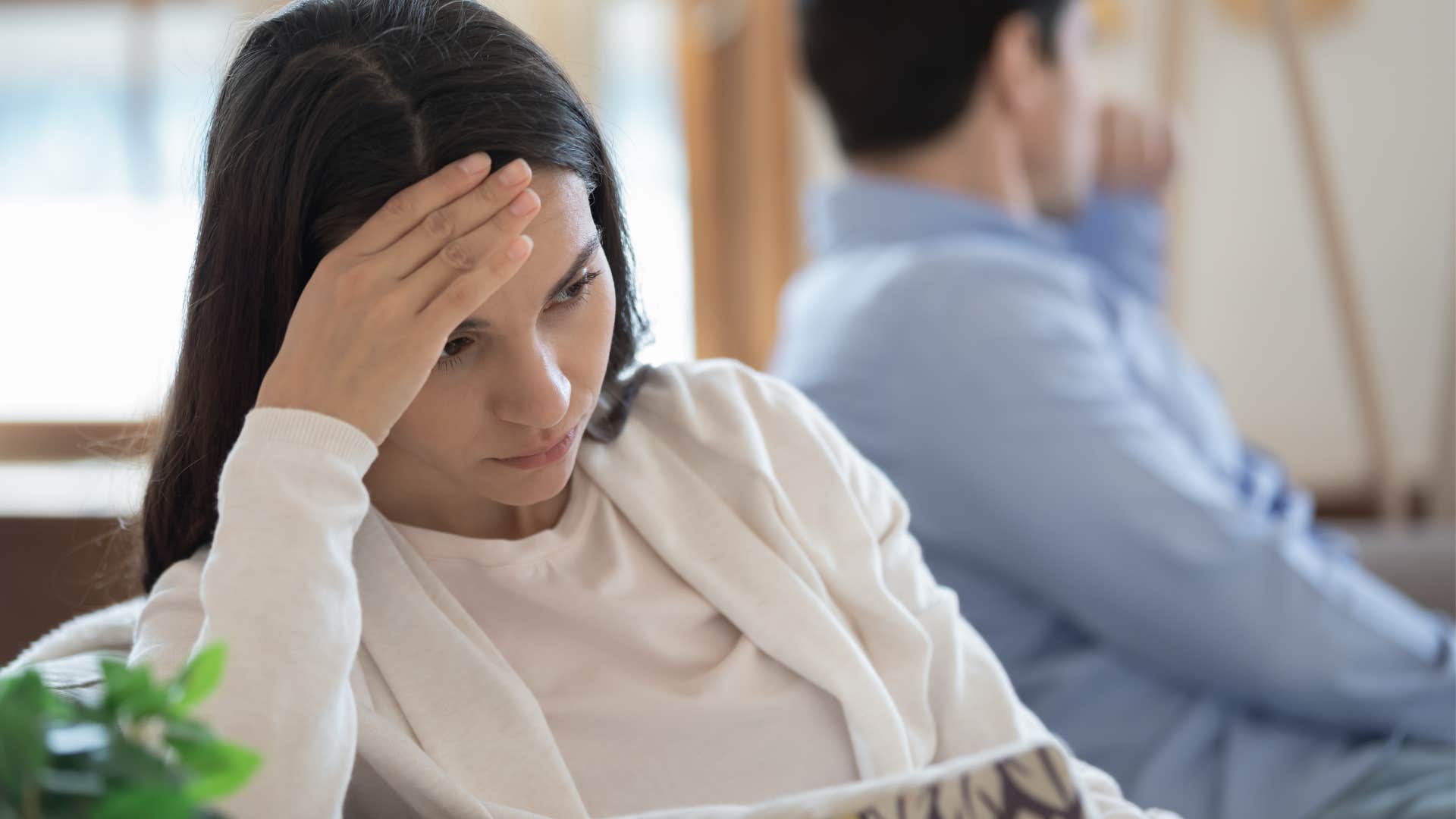 stubborn woman turned away from her husband