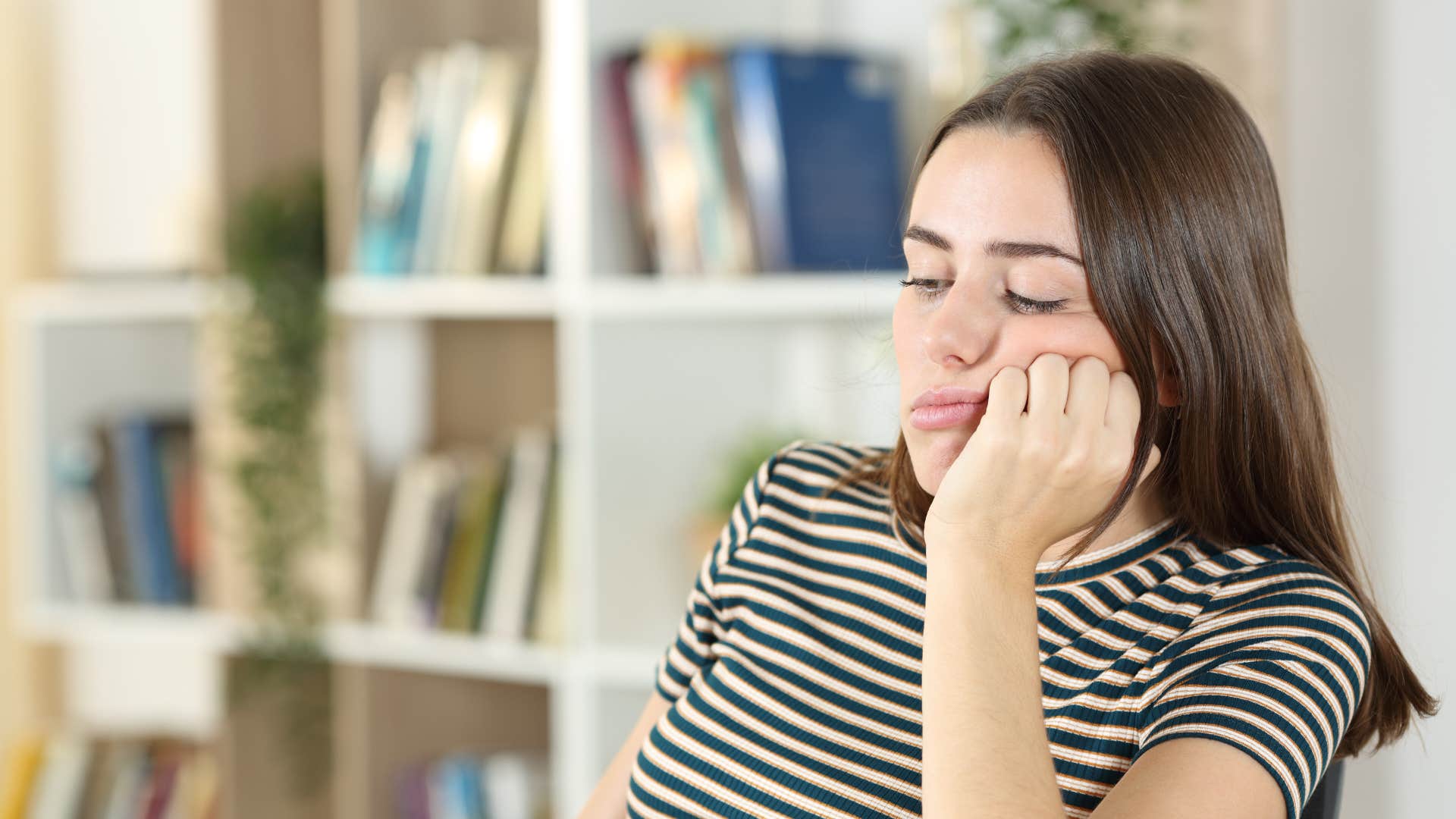 woman bored at home on the weekend