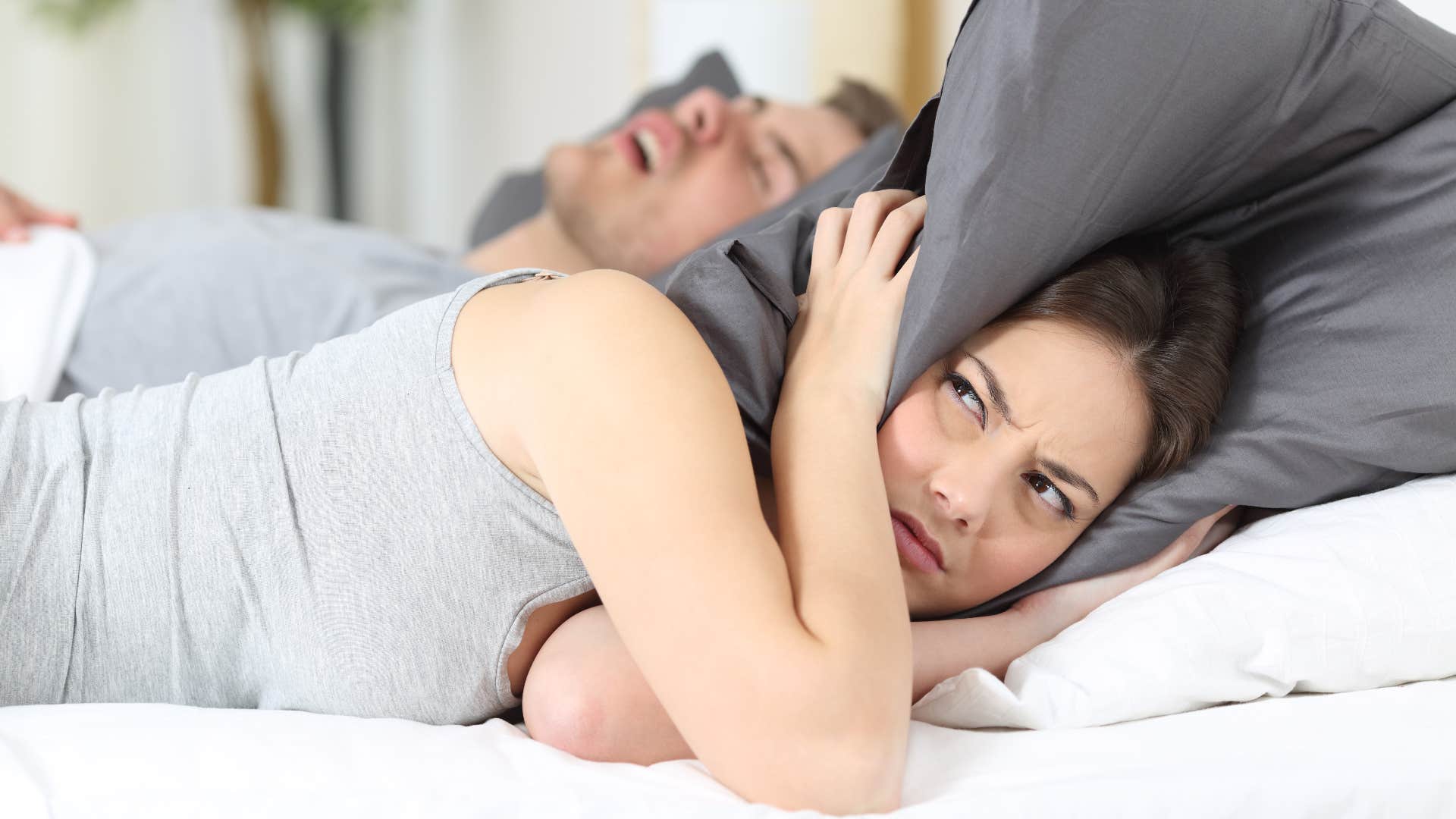 people who can't sleep without a fan blowing in their face usually have these reasons partner snores woman kept awake by husbands snoring