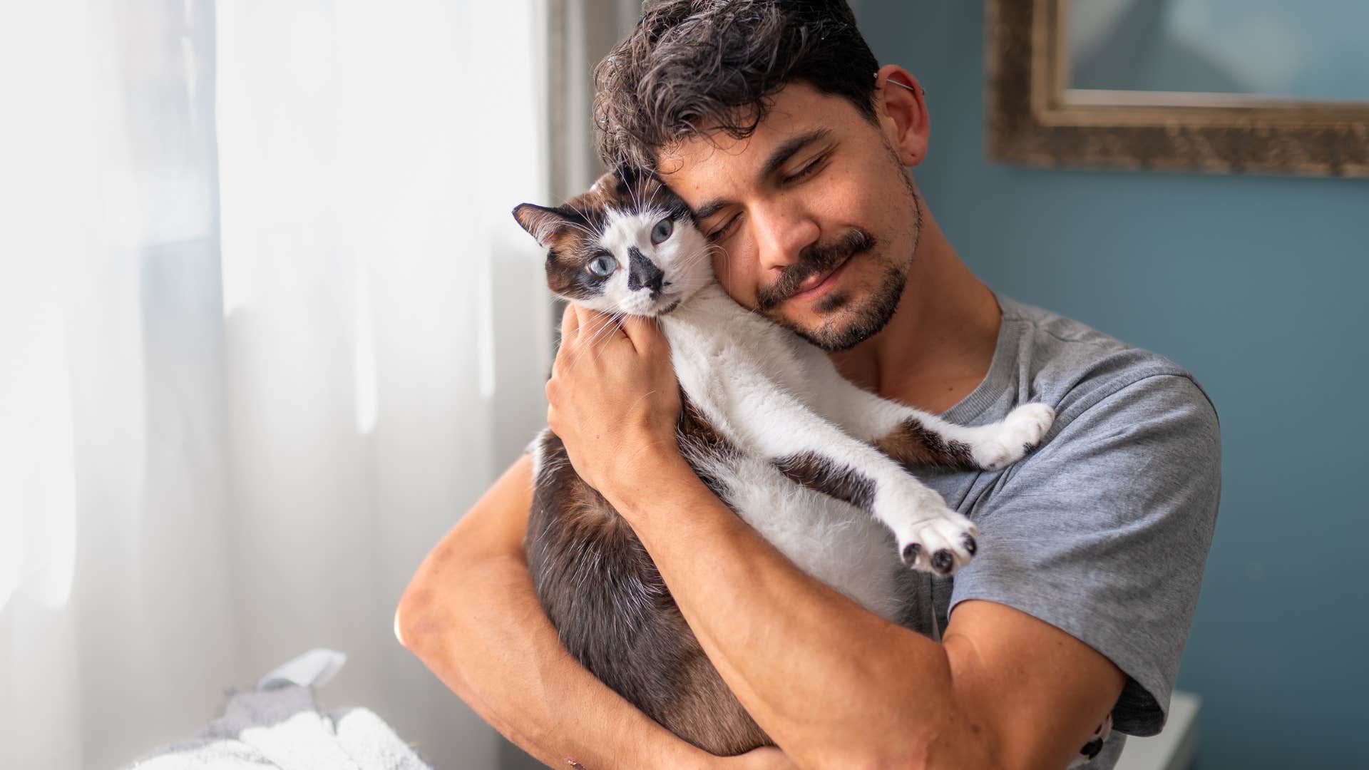 Man who's emotionally connected to his cat.
