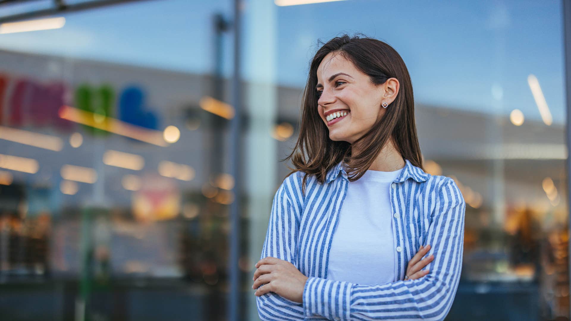 woman in white shirt being gracious for the present