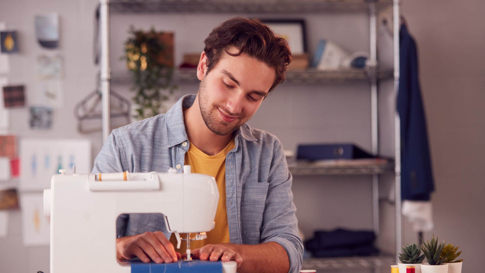 man in gray shirt rediscovering hobbies as he sews