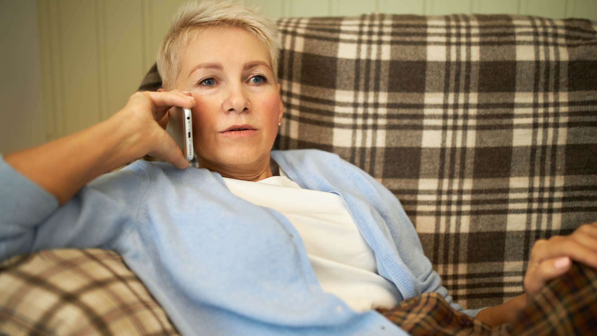 Woman saying "my house is such a mess right now" on the phone.